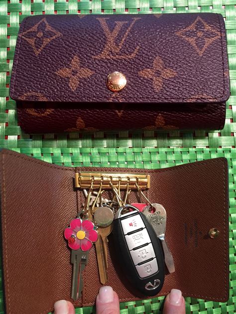 lv 6 ring key chain wallet|Products by Louis Vuitton: 6 Key Holder.